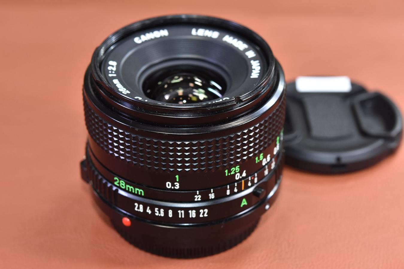 Canon New FD 28mm f2.8 MF 一眼カメラレンズ フード付 Canon New FD 28mm f2.8 MF 一眼カメラレンズ フード付 Canon NEW FD 28mm